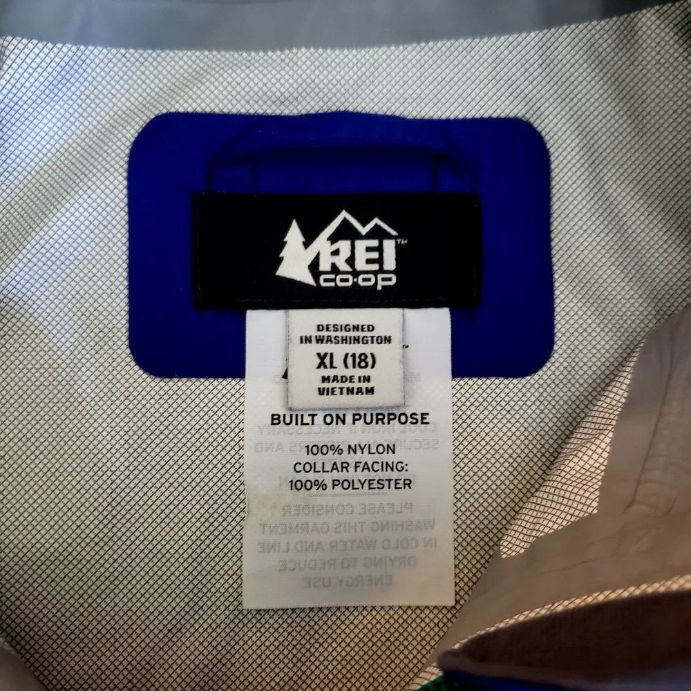 REI weather jacket, youth size 18